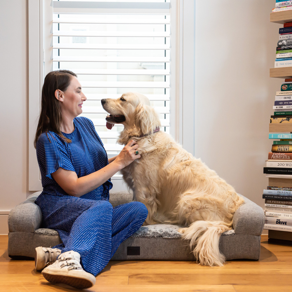 superior pet goods, orthopaedic dog bed, australian made, dog and person in bed